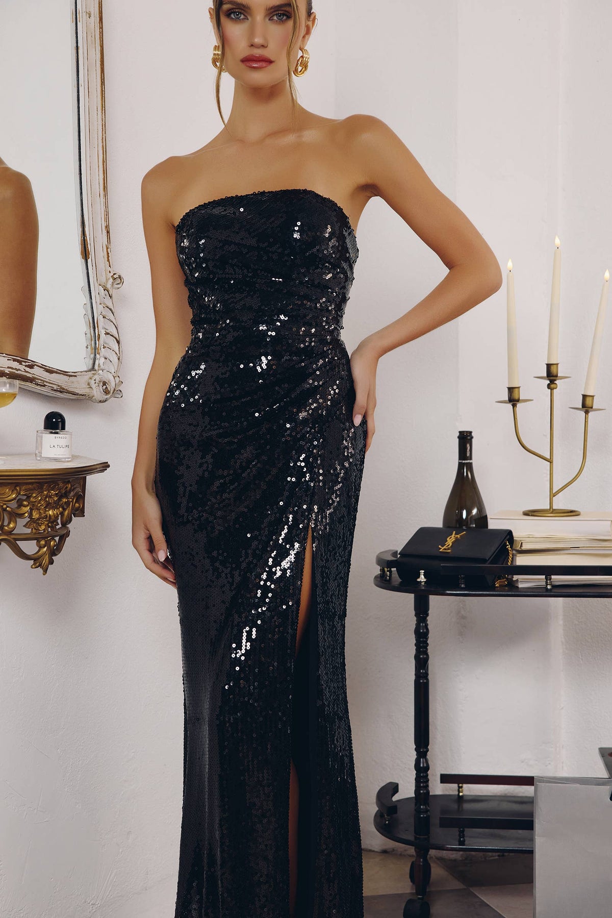STRAPLESS LIQUID SEQUIN FITTED GOWN WITH SLIT