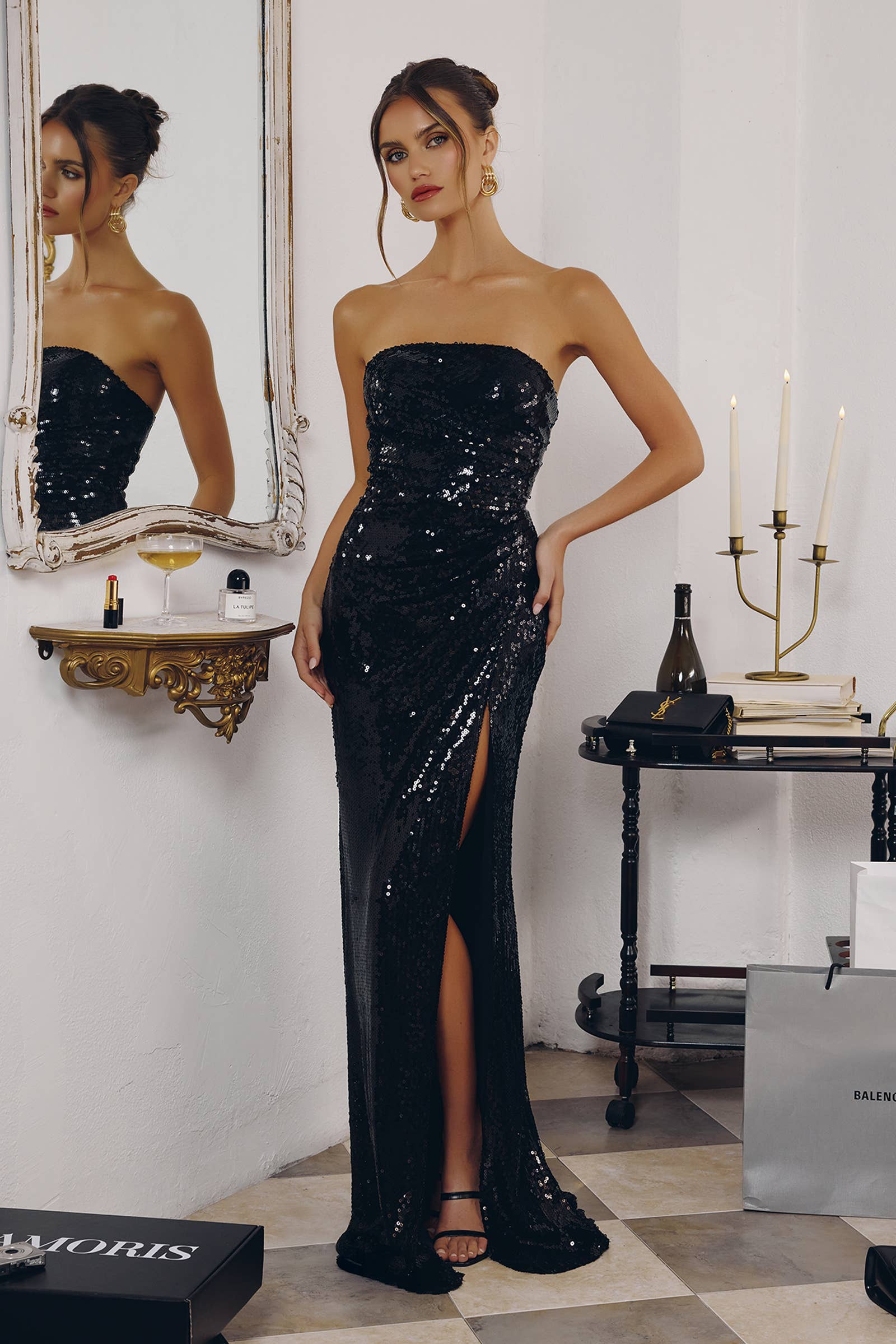 STRAPLESS LIQUID SEQUIN FITTED GOWN WITH SLIT